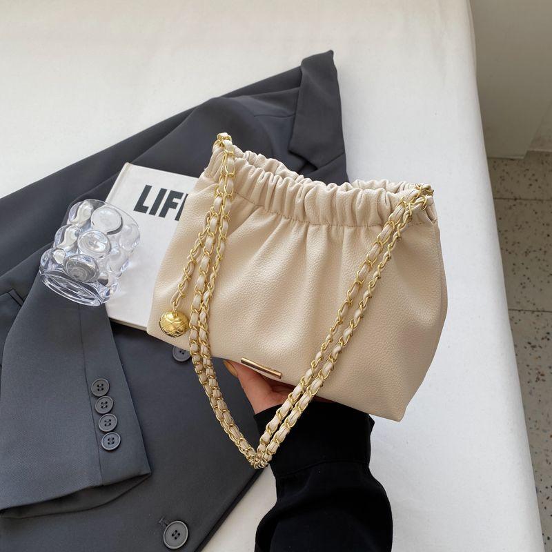 This year's popular bag women's new 2024 luxury solid color niche shoulder bag versatile chain crossbody bucket bag