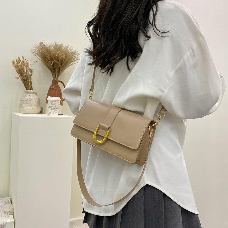 Baguette bag women's 2024 new fashion and elegant women's bag underarm horseshoe buckle shoulder messenger bag fashion simple and versatile baguette bag for women