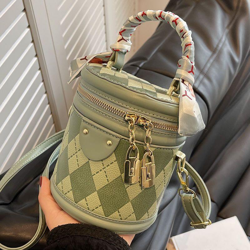 2024 Spring/Summer New Fashion Versatile Bucket Bag Contrast Color Lingge High Quality Scarf Decoration Elegant Handbag Cylinder Design Cute and Exquisite Crossbody Bag