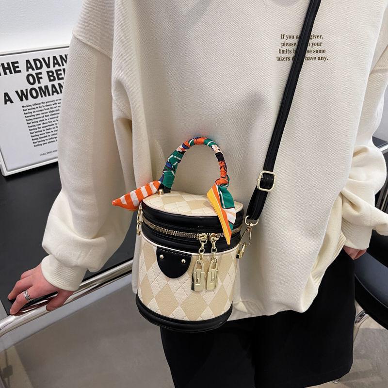 2024 Spring/Summer New Fashion Versatile Bucket Bag Contrast Color Lingge High Quality Scarf Decoration Elegant Handbag Cylinder Design Cute and Exquisite Crossbody Bag