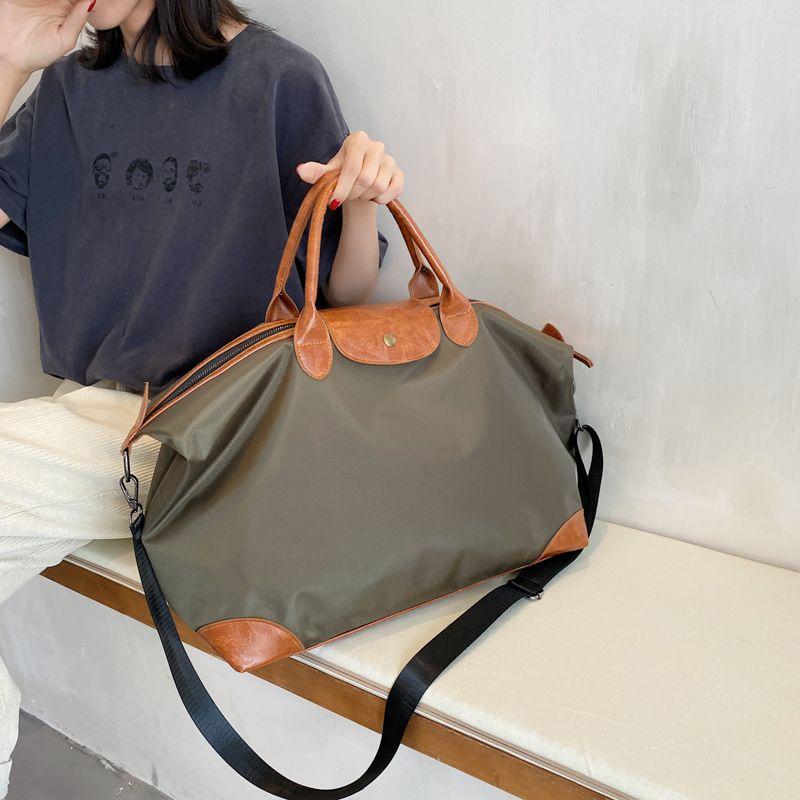 Commuter Tote Women's 2023 New Textured Portable Travel Dumpling Bag Waterproof Shoulder Large Capacity Bag female