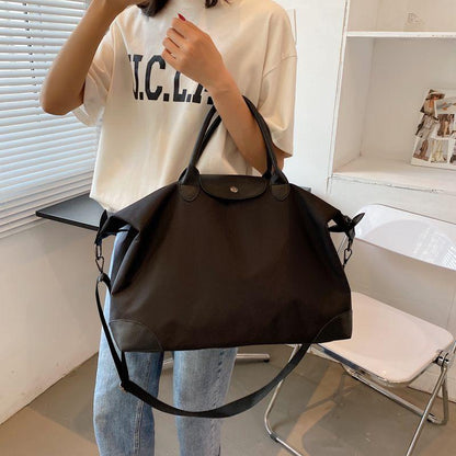 Commuter Tote Women's 2023 New Textured Portable Travel Dumpling Bag Waterproof Shoulder Large Capacity Bag female