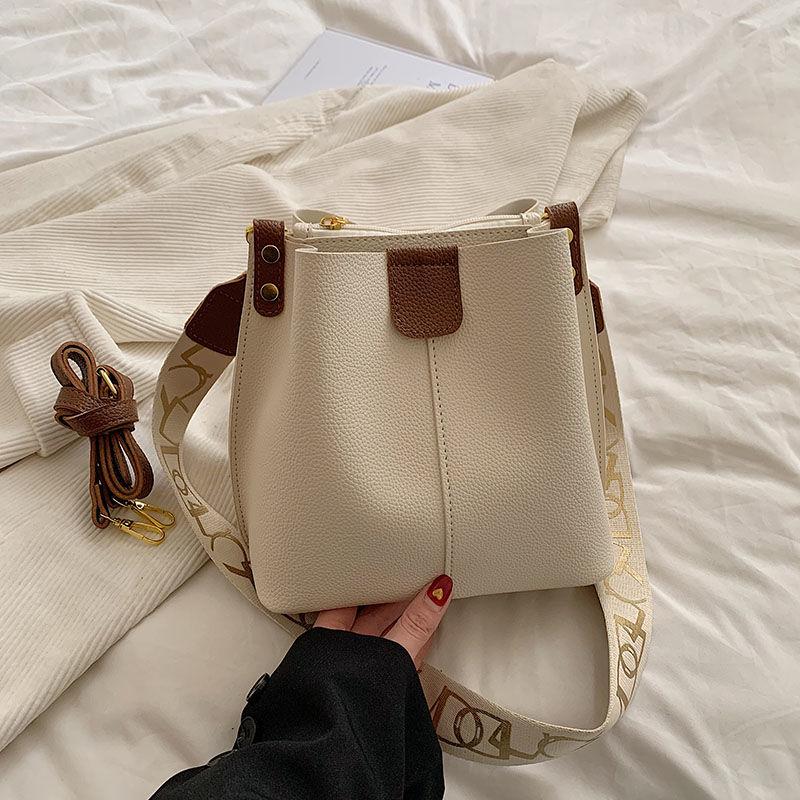 2024 Spring/Summer New Solid Color Fashion Versatile Large Capacity Bucket Bag Double Strap Shoulder Strap Wide Shoulder Strap Comfortable Portable Crossbody Bag Retro Classic Commuting High Quality Women's Bag