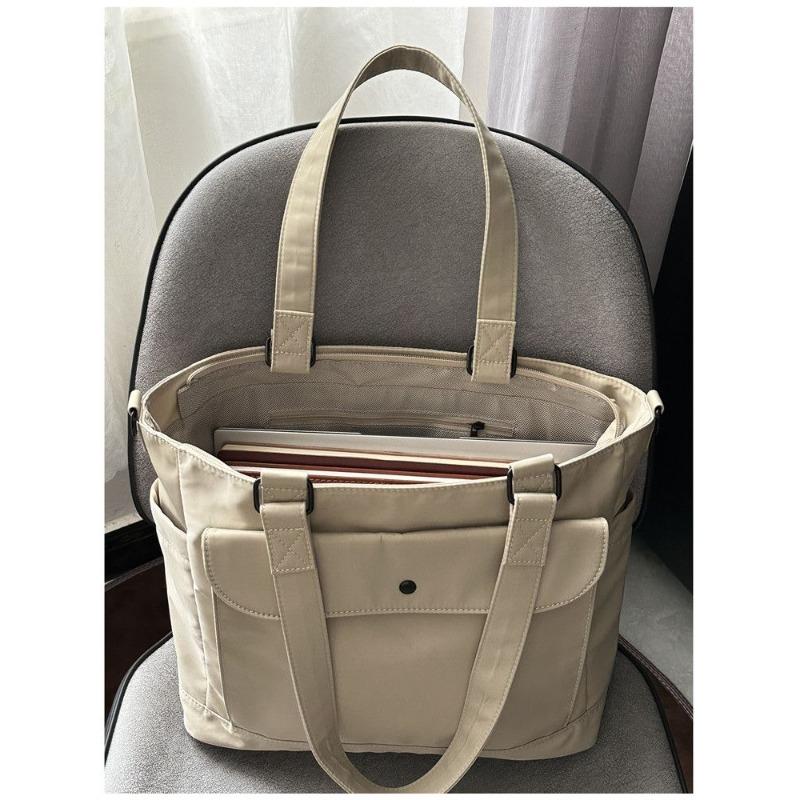 Waterproof nylon fabric crossbody bag with large capacity and lightweight tote bag, book and computer bag, commuting portable shoulder bag