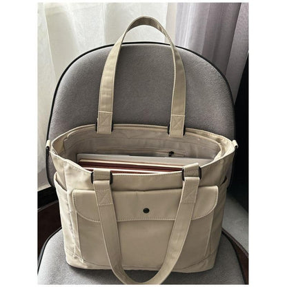 Waterproof nylon fabric crossbody bag with large capacity and lightweight tote bag, book and computer bag, commuting portable shoulder bag