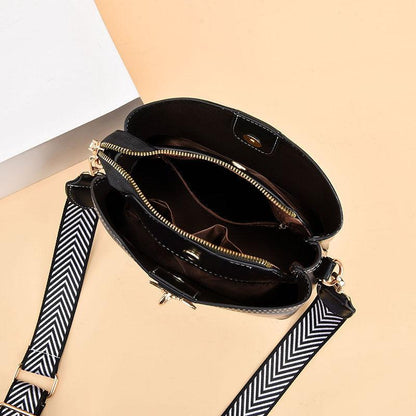 2024 Spring/Summer New Fashion Solid Color Shoulder Bag Versatile Casual Strap Bag Wide Shoulder Strap Simple and Elegant Bucket Bag Butterfly Decoration Women's Bag