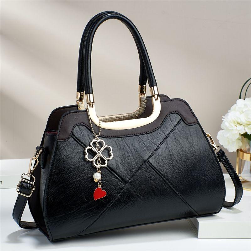 Large capacity portable bag for women 2024 new high-end texture niche design single shoulder bag retro elegant metal pendant decoration crossbody bag