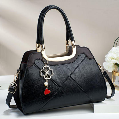 Large capacity portable bag for women 2024 new high-end texture niche design single shoulder bag retro elegant metal pendant decoration crossbody bag