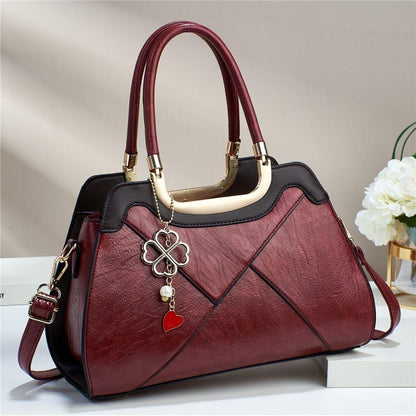 Large capacity portable bag for women 2024 new high-end texture niche design single shoulder bag retro elegant metal pendant decoration crossbody bag