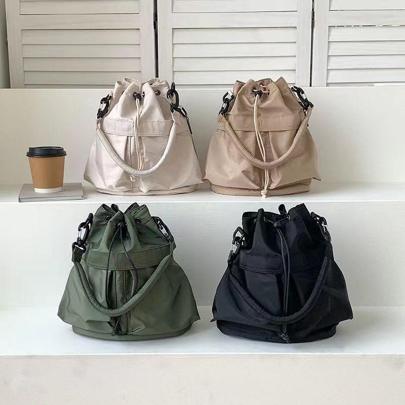 New Korean Style 2024 Fashion Women's Bag Nylon Drawstring Bucket Bag Versatile Handheld Shoulder Messenger Bag Casual