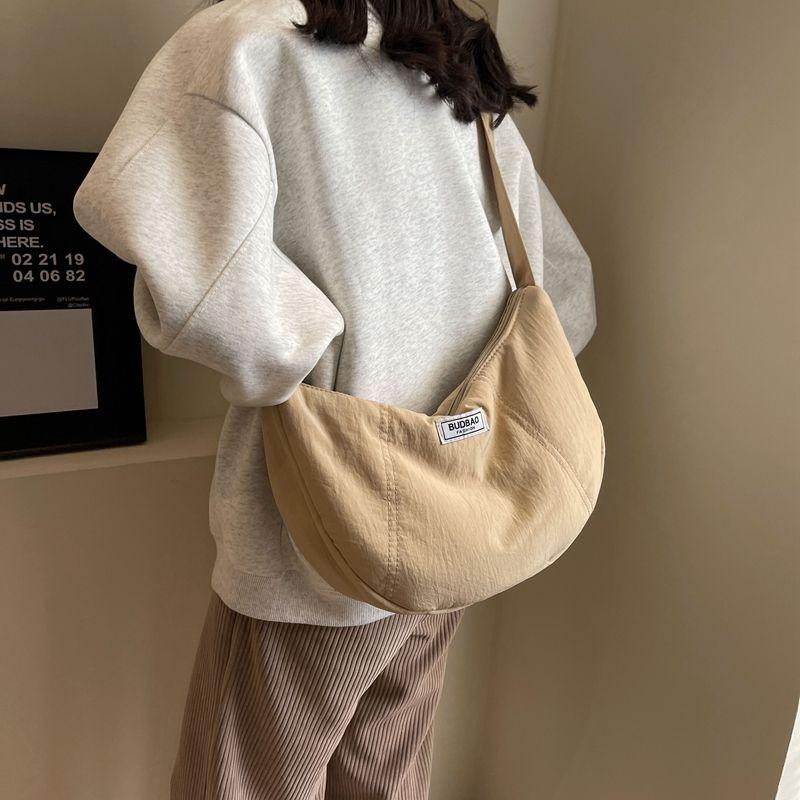 Japanese Fashion Crossbody Bag Women's 2024 Solid Color Large Capacity Shoulder Messenger Bag New Casual All-Matching Dumpling Bag Ladies