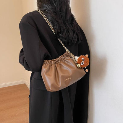 This year's popular bag women's new 2024 luxury solid color niche shoulder bag versatile chain crossbody bucket bag