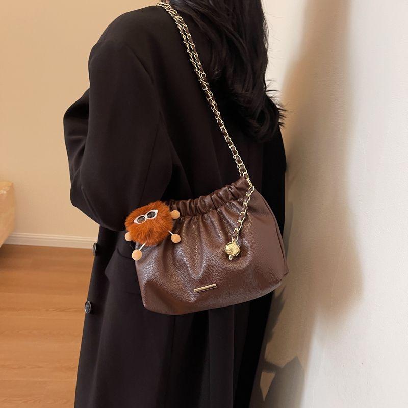 This year's popular bag women's new 2024 luxury solid color niche shoulder bag versatile chain crossbody bucket bag