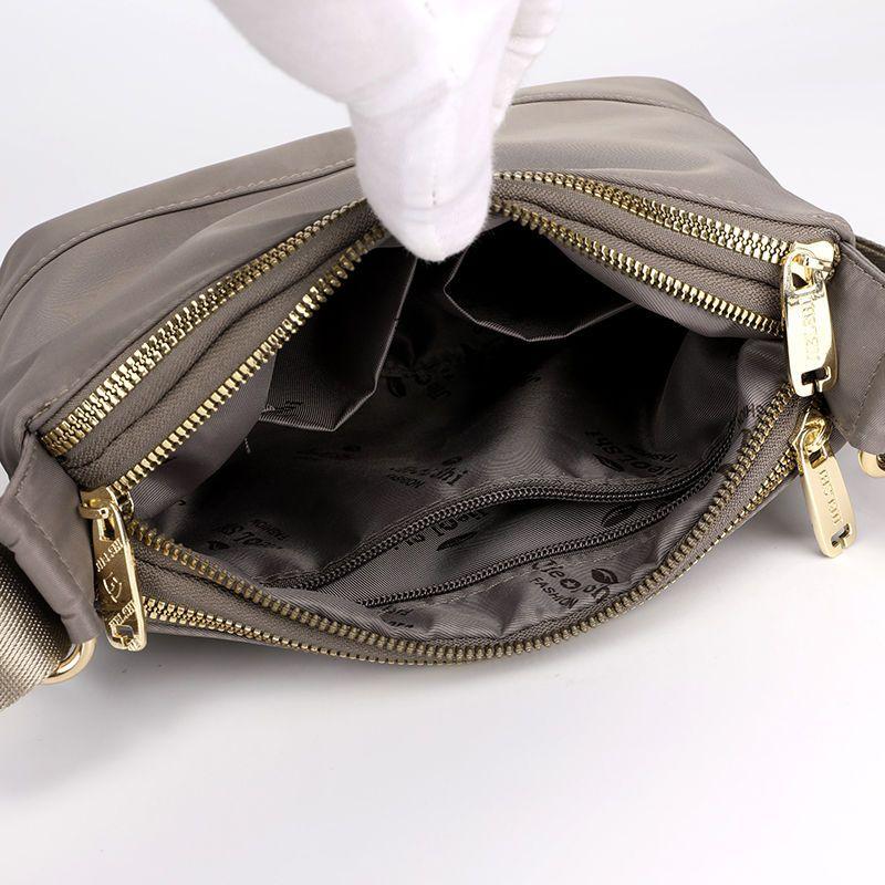 Women's Fashion Bag 2024 Spring and Summer New with Leather Messenger Bag Shoulder Bag Multi-Layer Women's Bags Waterproof Cloth Bag