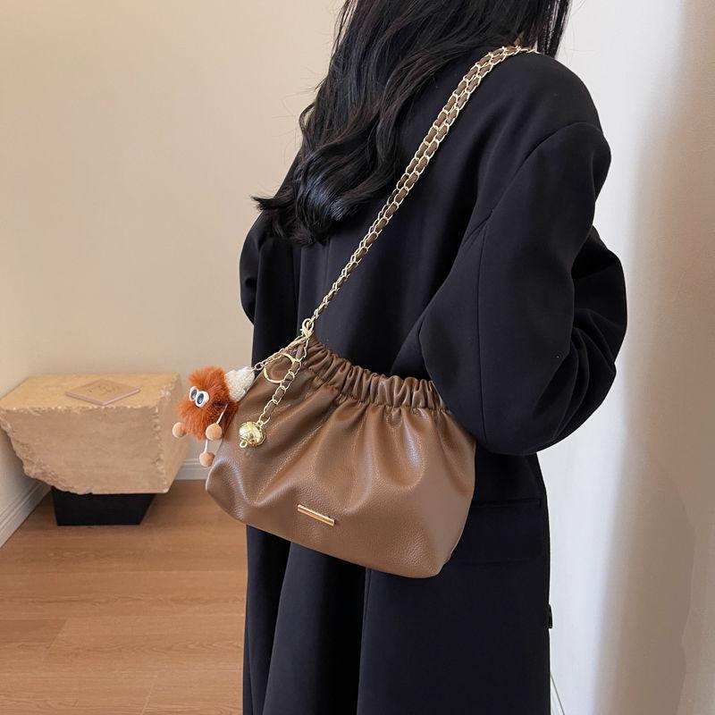 This year's popular bag women's new 2024 luxury solid color niche shoulder bag versatile chain crossbody bucket bag