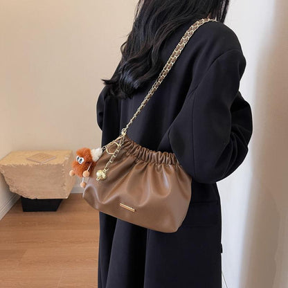 This year's popular bag women's new 2024 luxury solid color niche shoulder bag versatile chain crossbody bucket bag