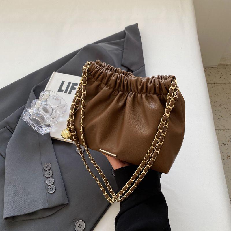 This year's popular bag women's new 2024 luxury solid color niche shoulder bag versatile chain crossbody bucket bag