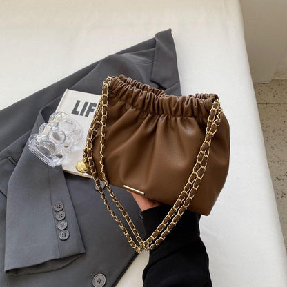 This year's popular bag women's new 2024 luxury solid color niche shoulder bag versatile chain crossbody bucket bag