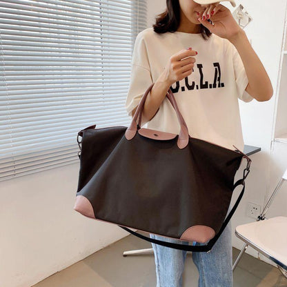 Commuter Tote Women's 2023 New Textured Portable Travel Dumpling Bag Waterproof Shoulder Large Capacity Bag female