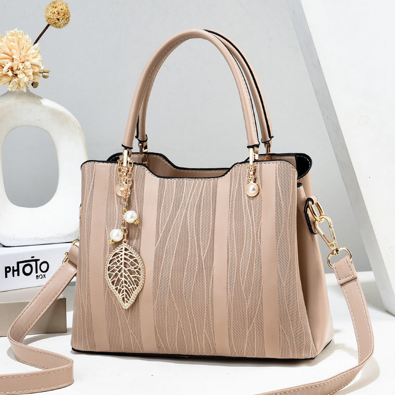 High quality solid color women's bag 2024 Spring and Autumn New fashion temperament versatile handbag Large capacity commuting elegant single shoulder messenger bag Solid color simple small square bag