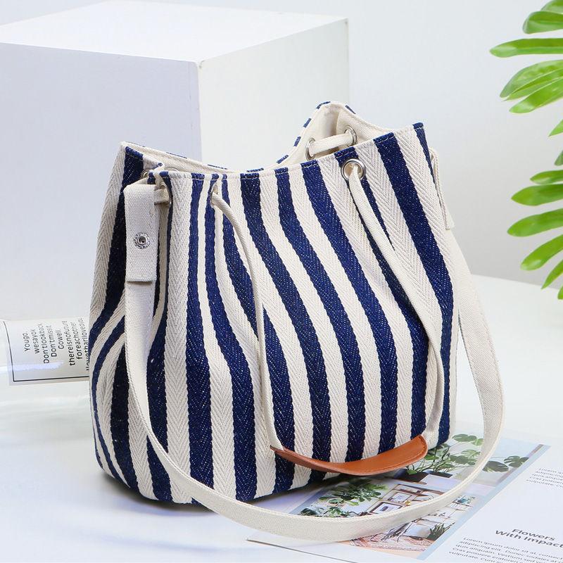 New women's bag canvas bucket bag striped shoulder bag diagonal multi-purpose bag Korean version fashion solid color mummy handbag