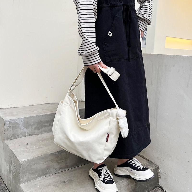 Simple canvas bag women's 2024 Japanese canvas bag women's messenger bag women's simple fashion cloth bag student casual large-capacity canvas shoulder bag women