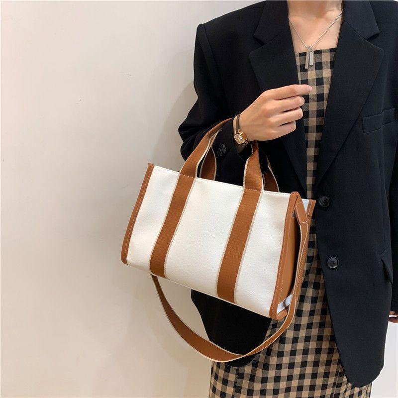 Messenger bag fashion commuter tote bag 2024 new large-capacity female canvas atmospheric simple shoulder bag hand-held