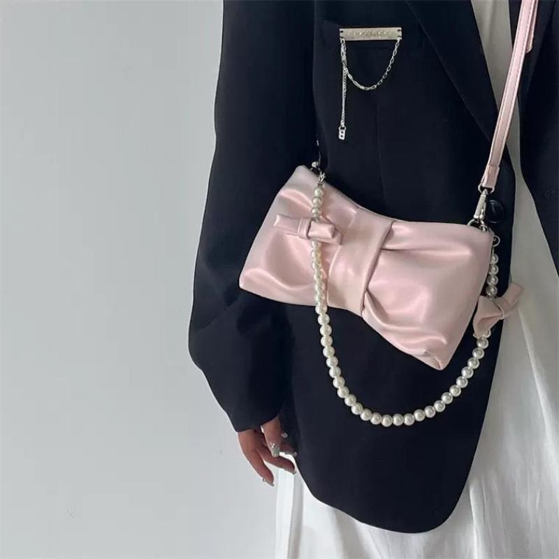 Girls' pearl bow underarm women's bag 2024 new fresh fairy bag Korean version shoulder bag portable messenger bag high-quality women's bag pink women's bag delicate handbag wedding bag