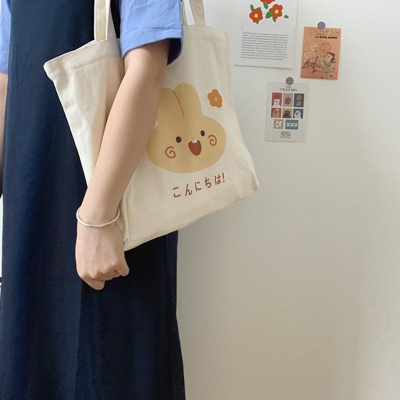 Cartoon canvas bag female 2024 new large-capacity canvas bag female Harajuku shoulder bag simple handbag canvas large bag student schoolbag