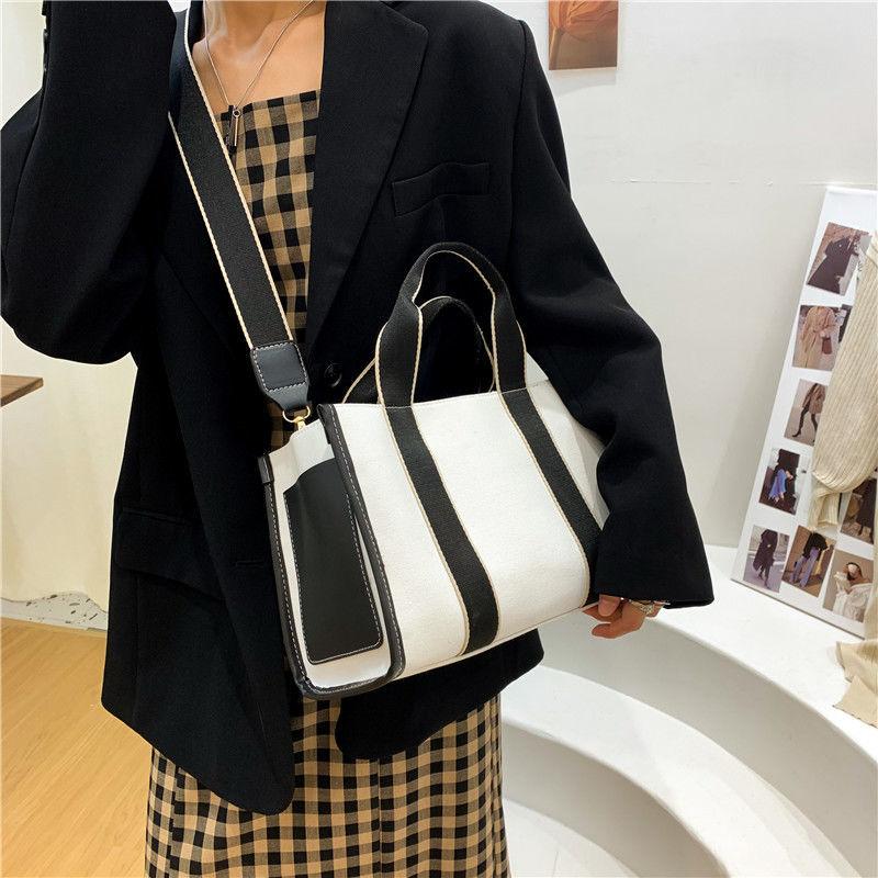 Messenger bag fashion commuter tote bag 2024 new large-capacity female canvas atmospheric simple shoulder bag hand-held