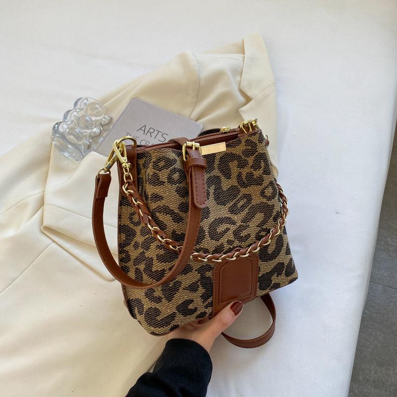 Fashion bucket bag High quality women's bag New advanced texture bucket bag Fashion leopard cross body bag Chessboard case handbag