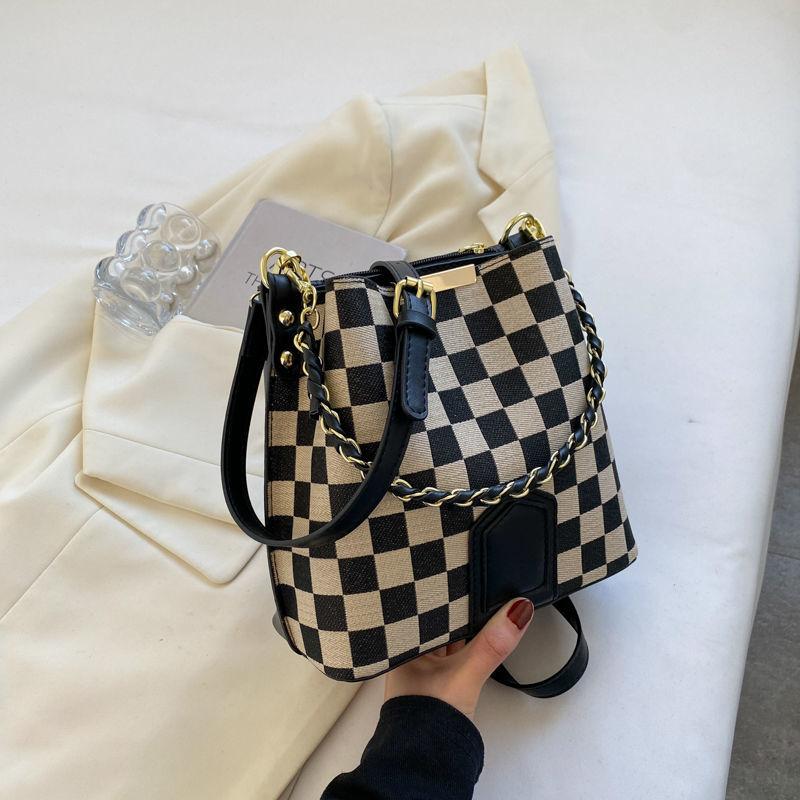 Fashion bucket bag High quality women's bag New advanced texture bucket bag Fashion leopard cross body bag Chessboard case handbag