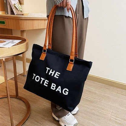 Canvas bag women's large capacity bag 2024 autumn and winter new fashion retro letter shoulder bag versatile portable shopping bag simple casual temperament large canvas bag women