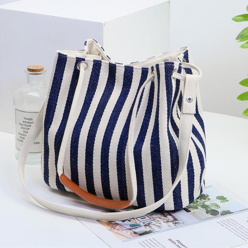 New women's bag canvas bucket bag striped shoulder bag diagonal multi-purpose bag Korean version fashion solid color mummy handbag