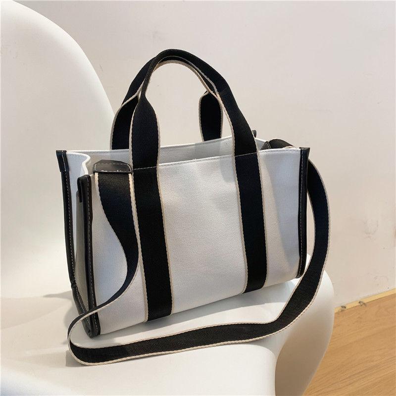 Messenger bag fashion commuter tote bag 2024 new large-capacity female canvas atmospheric simple shoulder bag hand-held