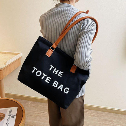 Canvas bag women's large capacity bag 2024 autumn and winter new fashion retro letter shoulder bag versatile portable shopping bag simple casual temperament large canvas bag women