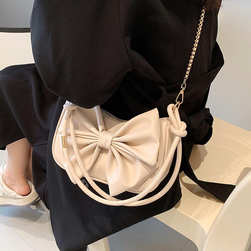 Advanced sense chain small bag women's 2024 new versatile underarm bag single shoulder bag texture messenger bag bow cute leather bag fashion portable small bag sweet style women's bag