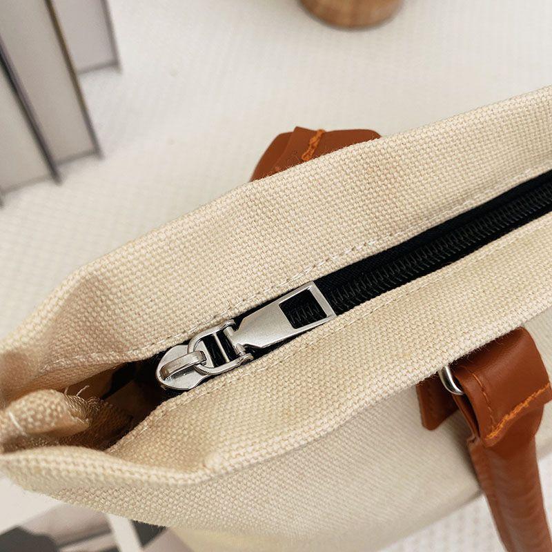 Canvas bag women's large capacity bag 2024 autumn and winter new fashion retro letter shoulder bag versatile portable shopping bag simple casual temperament large canvas bag women