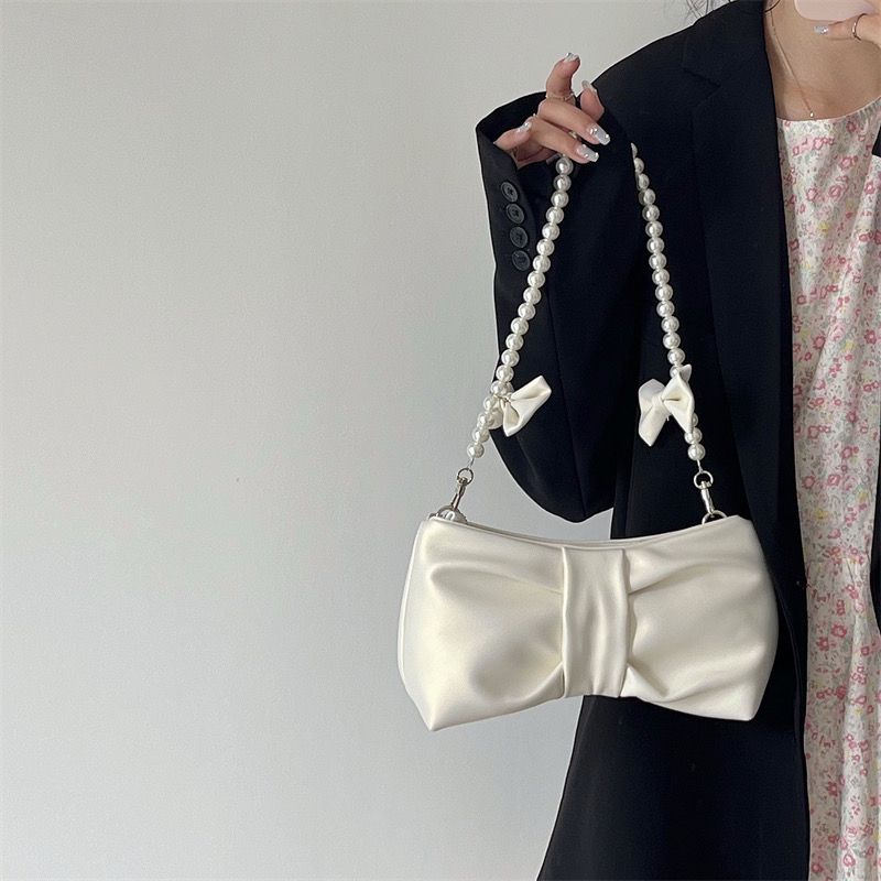 Girls' pearl bow underarm women's bag 2024 new fresh fairy bag Korean version shoulder bag portable messenger bag high-quality women's bag pink women's bag delicate handbag wedding bag