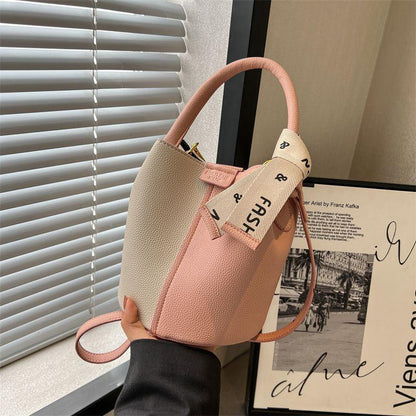 Popular fashion item this year Elegant temperament Small bag for women 2024 New summer Fashionable casual commuting ins Crossbody bag Contrast color design Simple and elegant Fashion Portable bucket bag