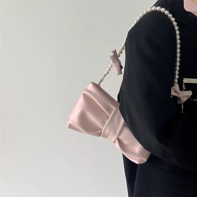 Girls' pearl bow underarm women's bag 2024 new fresh fairy bag Korean version shoulder bag portable messenger bag high-quality women's bag pink women's bag delicate handbag wedding bag