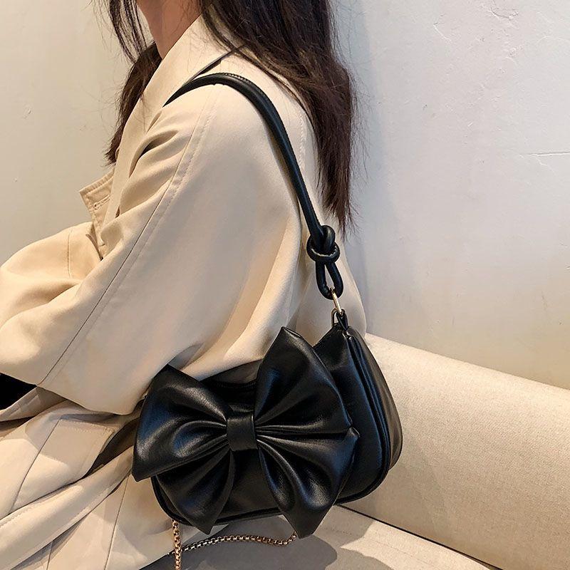 Advanced sense chain small bag women's 2024 new versatile underarm bag single shoulder bag texture messenger bag bow cute leather bag fashion portable small bag sweet style women's bag