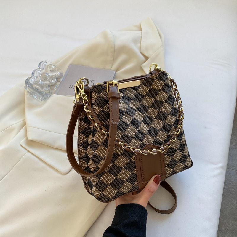 Fashion bucket bag High quality women's bag New advanced texture bucket bag Fashion leopard cross body bag Chessboard case handbag