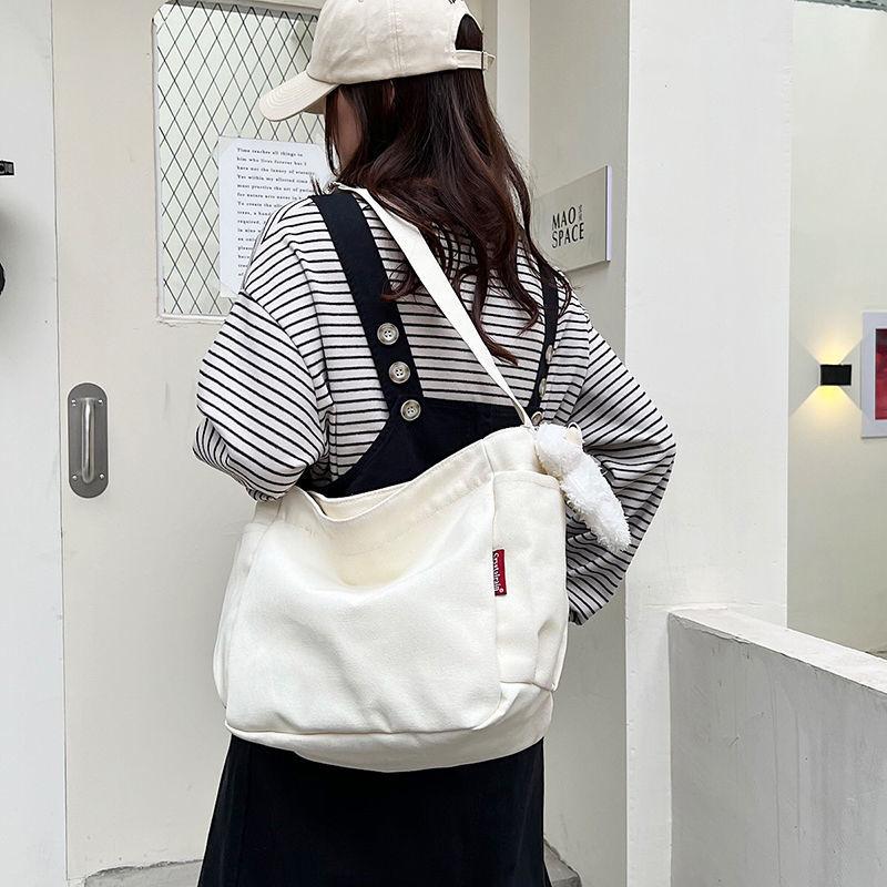 Simple canvas bag women's 2024 Japanese canvas bag women's messenger bag women's simple fashion cloth bag student casual large-capacity canvas shoulder bag women