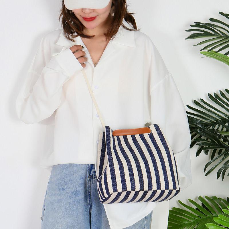 New women's bag canvas bucket bag striped shoulder bag diagonal multi-purpose bag Korean version fashion solid color mummy handbag