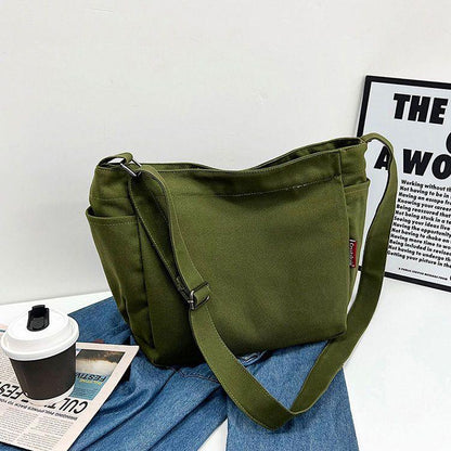 Simple canvas bag women's 2024 Japanese canvas bag women's messenger bag women's simple fashion cloth bag student casual large-capacity canvas shoulder bag women