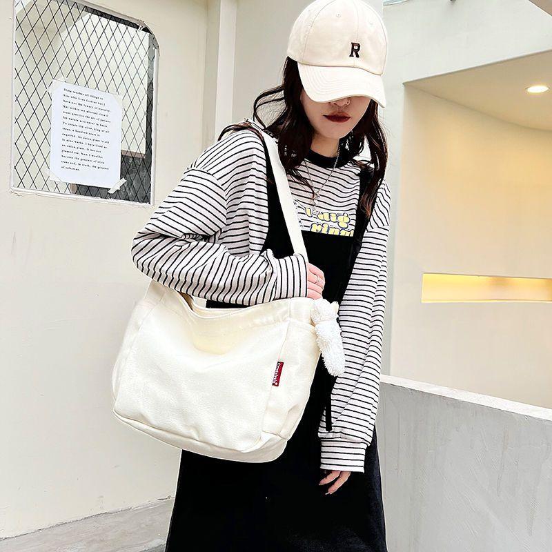 Simple canvas bag women's 2024 Japanese canvas bag women's messenger bag women's simple fashion cloth bag student casual large-capacity canvas shoulder bag women