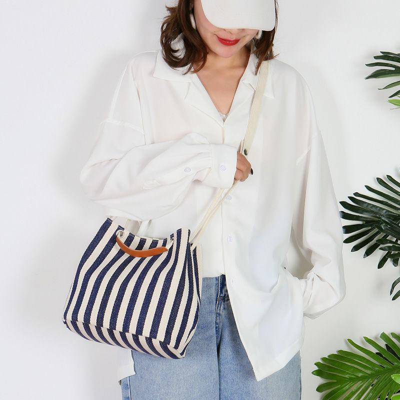 New women's bag canvas bucket bag striped shoulder bag diagonal multi-purpose bag Korean version fashion solid color mummy handbag