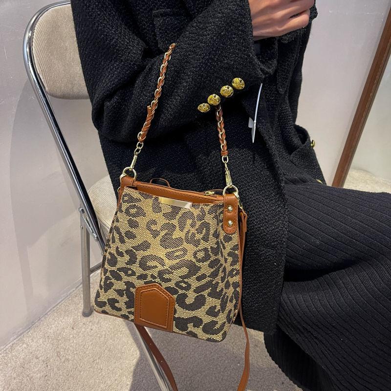 Fashion bucket bag High quality women's bag New advanced texture bucket bag Fashion leopard cross body bag Chessboard case handbag